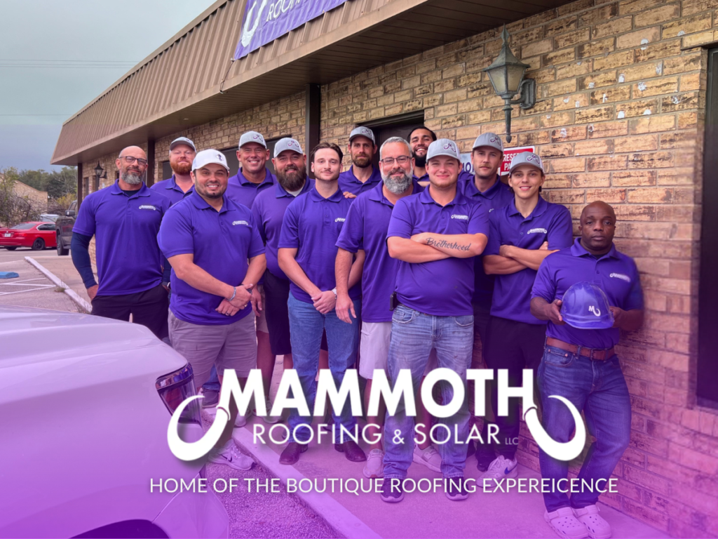 Mammoth Roofing & Solar team standing outside company office, dressed in purple uniforms, showcasing team unity and professionalism